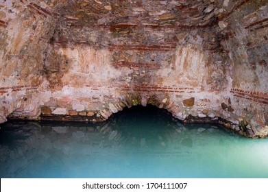 interior view of the swimming pool cave with the thermal and sulphurous waters of the ancient Roman baths of Baños romanos de la Hedionda, Casares, Spain