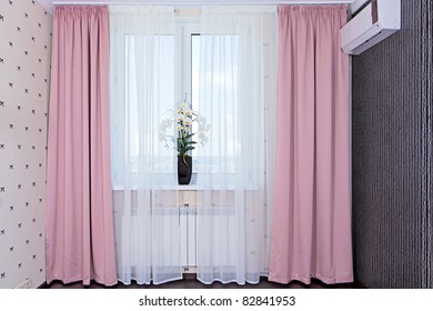 Interior View Of Window With Curtains In Bedroom