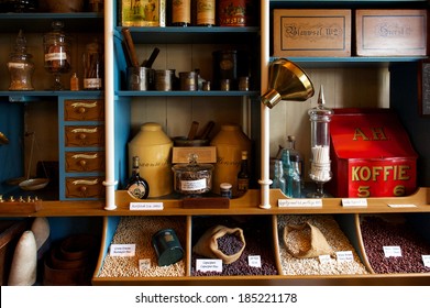 Interior of vintage grocery store with retro goods on the shelves, the Netherlands
