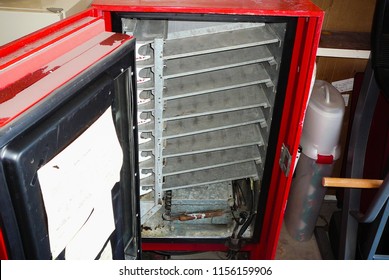 Interior Of Vintage Soda Machine Showing Shelves For Loading Soda Bottles