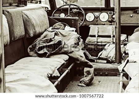 Interior of vintage wartime troop carrier - black and white