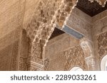 Interior walls of Alhambra -- a palace and fortress complex located in Granada, Andalusia, Spain. Islamic Moorish architecture.