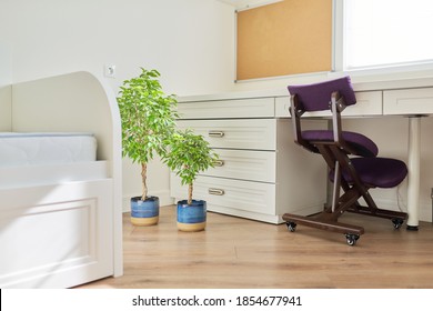 Interior, White Furniture, Table And Chair Near The Window, Cork Board On The Wall. Workplace In Children's Room, In Home Office, Modern Classic Style, Ergonomic Orthopedic Knee Chair