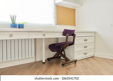 Interior, White Furniture, Table And Chair Near The Window, Cork Board On The Wall. Workplace In Children's Room, In Home Office, Modern Classic Style, Ergonomic Orthopedic Knee Chair