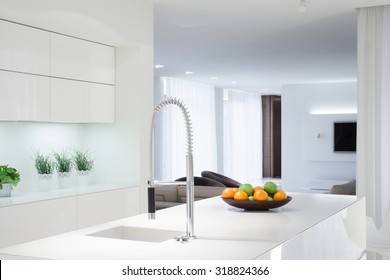 Interior of white kitchen with color details - Powered by Shutterstock