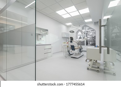 Interior Of White Modern Dentistry Medical Room With Special Equipment