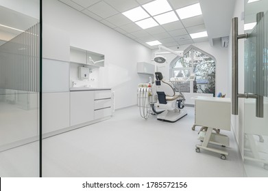 Interior Of White Modern Dentistry Medical Room With Special Equipment