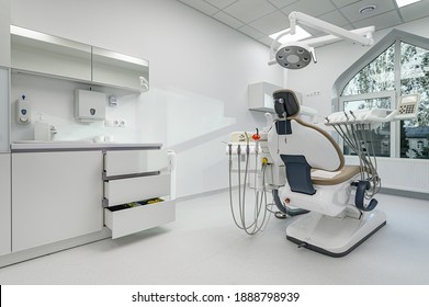 Interior Of White Modern Dentistry Medical Room With Special Equipment