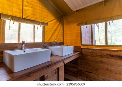 Interior Of A Wooden Toilet In Rustic Colonial Style