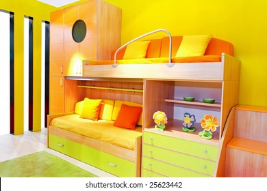 Interior Of Yellow Kids Room With Bunk Beds