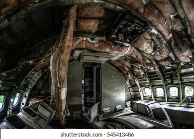 Interiors Of Abandoned Airplane, Old Crashed Aircraft, Plane Wreck In Graveyard
