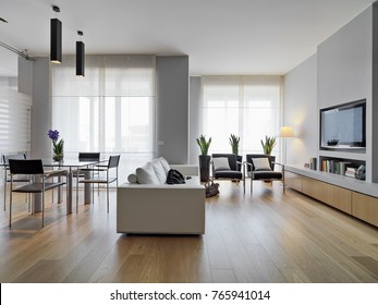 Interiros Shots Of A Modern Living Room In The Foreground The Leather Sofa And The Glass Dining Table The Floor Is Made Of Wood