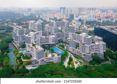 The Interlace Apartments In Singapore City And Skyscrapers Buildings. Modern Architecture Background. Aerial View