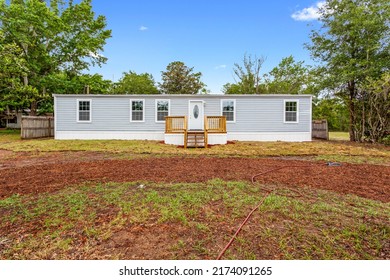 Interlachen, FL USA - July 2 2022: Front Exterior Of A Small Modular Home On A Nice Day