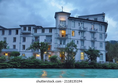 Interlaken, Switzerland - June 11, 2010: Prestige Hotel By The Lake Shore At Sunset Time.