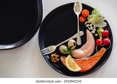 Intermittent fasting method - sixteen hours diet, eight hours eating time. Healthy lifestyle concept. Close-up, copy space, top view.