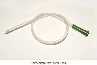 an intermittent transparent catheter isolated over a white background