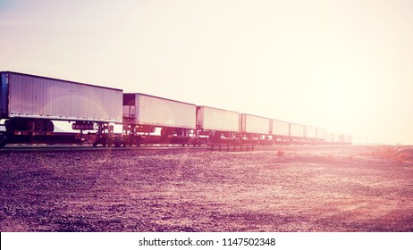 Intermodal Freight Transport, Semi Trailers On Train At Sunset, Color Toned Picture, USA.