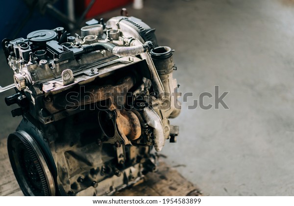 The internal combustion engine is\
assembled on the floor. Car engine repair and\
purchase