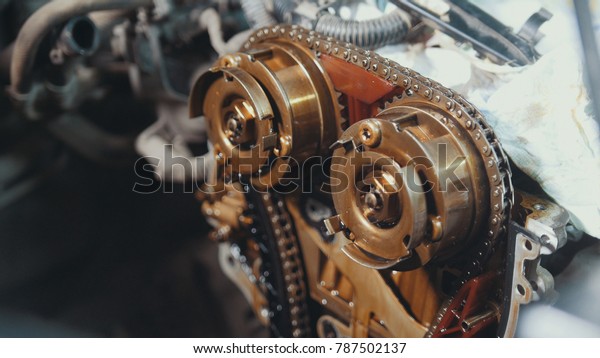 The internal combustion engine,\
repair at car service, details under the hood of the\
car