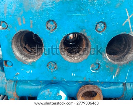 Internal components of a triplex pump during full maintenance disassembly, revealing plungers, pistons, and precision mechanical parts that operate behind high pressure pumping systems.