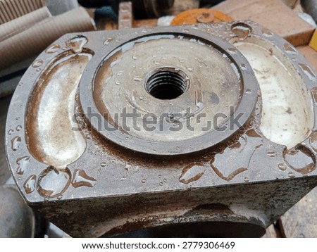 Internal components of a triplex pump during full maintenance disassembly, revealing plungers, pistons, and precision mechanical parts that operate behind high pressure pumping systems.