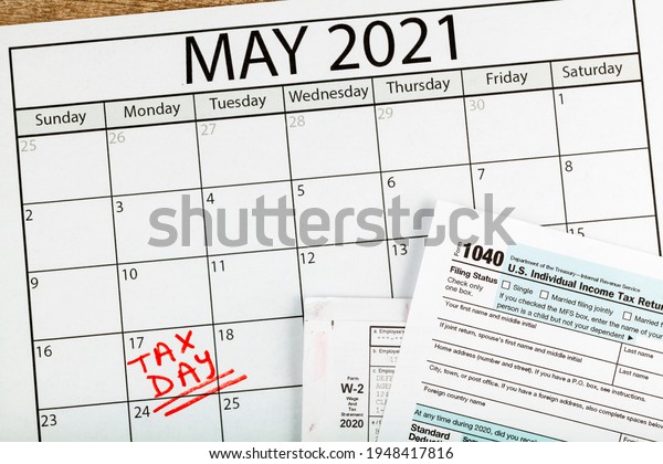 Internal\
Revenue Service (IRS) has extended the deadline for filing US\
federal income tax until May 17 2021. Concept image showing a\
calendar page marking the new tax day for\
2021.