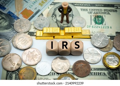 Internal Revenue Service (IRS) Is A U.S. Government Agency Responsible For The Collection Of Taxes And Enforcement Of Tax Laws.The Word Is Written On Money And Gold Background