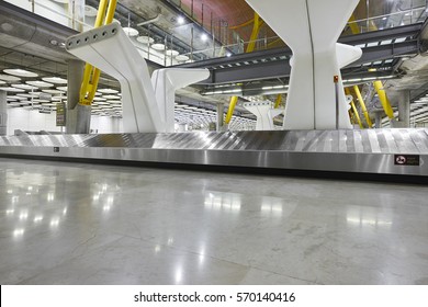 International airport baggage belt claim area. Nobody. Travel background. Horizontal - Shutterstock ID 570140416