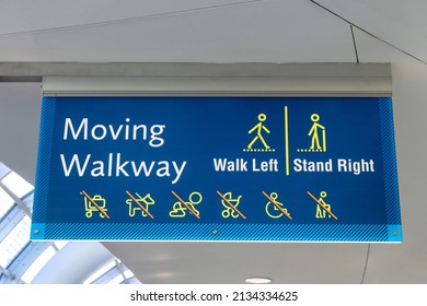 International Airport Sign Moving Walkway Walk Left Stand Right In Interior Air Terminal