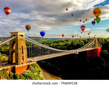 The international balloon fiesta is an annual event in Bristol. This photo captures the afternoon flight as the balloons come over the Clifton Suspension Bridge. Photo taken in 2012.