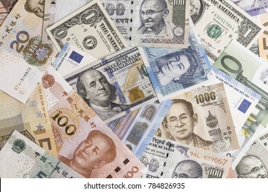 International banknotes from world major countries using as Forex or financial economy background, US dollar, UK pound, Euro, Japanese yen, Indian rupee, Chinese yuan, Thai Baht.