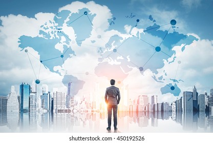 International business concept with businessman on New York city background with network on map and sunlight - Shutterstock ID 450192526