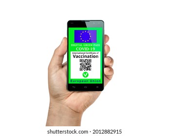 International certificate of vaccination. European Green Pass showed on smartphone display hand isolated on white