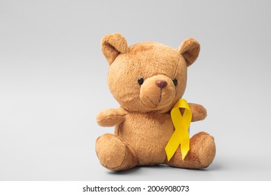 International Childhood Cancer Awareness month, Children toy with golden color Ribbon for supporting kids living. Healthcare and World cancer day concept - Shutterstock ID 2006908073