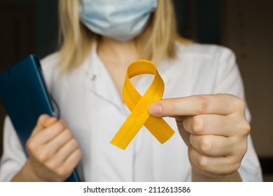 International Childhood Cancer Day. Female Doctor In White Coat Holds Yellow Ribbon. Sarcoma Awareness, Bladder Cancer. Leukemia Cancer Awareness. World Multiple Sclerosis Day. I Am And I Will.