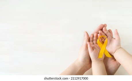 International Childhood Cancer Day. Mom And Baby Are Holding Yellow Ribbon In Their Hands. Sarcoma Awareness, Bladder Cancer. Leukemia Cancer Awareness. World Multiple Sclerosis Day. I Am And I Will