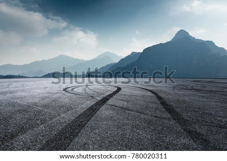 international circuit asphalt ground and mountain nature landscape in foggy day