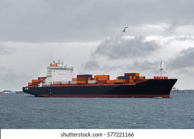 International Container Cargo Ship In The Baltic Sea In A Storm. Image Retro Vintage Filter Effect.