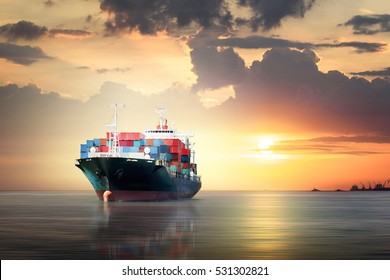International Container Cargo ship in the ocean as sunset sky, Freight Transportation, Shipping - Shutterstock ID 531302821