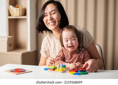 International Down Syndrome Day, March 21,happy Childhood, Cute Girl With Mom Laughing