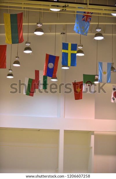 International Flags Hanging Ceiling Sport Hall Stock Photo