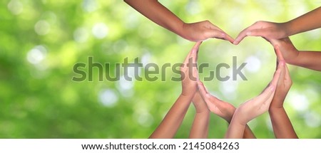 International Human Solidarity Day concept: Unity and diversity are at the heart of a diverse group of people connected together as a supportive symbol that represents a sense of teamwork.