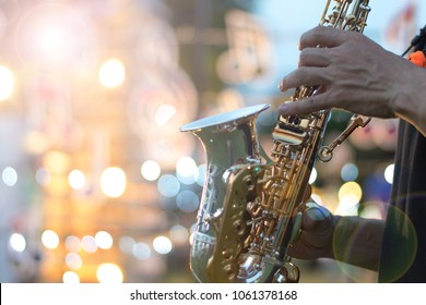 International Jazz Day And World Jazz Festival. Saxophone, Music Instrument Played By Saxophonist Player Musician In Fest.