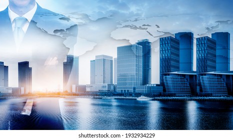 international lawyer or businessman in a suit. Against the background of skyscraper buildings with a global trading space. Beautiful image suitable for background, inspiration, business or news image