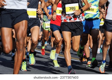 International Marathon Running Race, People Feet on City Road - Powered by Shutterstock