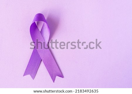 International Overdose Awareness Day. The purple ribbon on the purple background