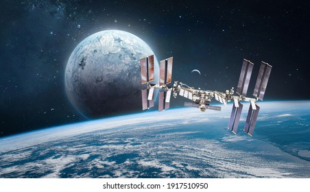 International Space Station On Orbit Of The Earth Planet. View From Space On ISS. Sci-fi Wallpaper. Elements Of This Image Furnished By NASA