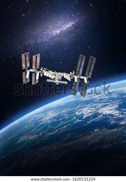 International space station on orbit of Earth planet\
view from outer space. ISS. Nebula. Vertical wallpaper. Elements of\
this image furnished by\
NASA