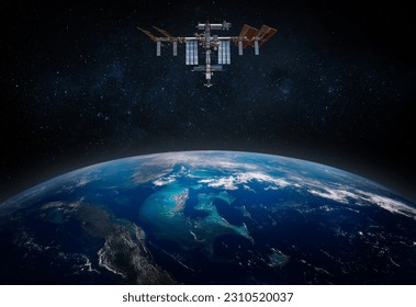 The International Space Station orbiting planet Earth. Elements of this image furnished by NASA. Scientific space exploration using a space station. - Shutterstock ID 2310520037